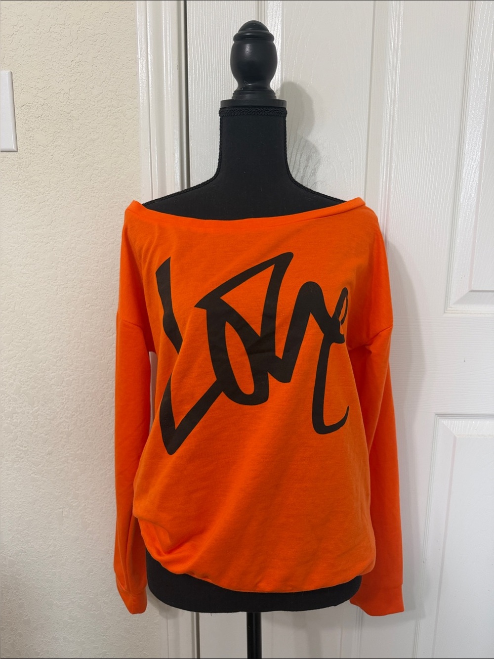 Women's Orange Off-Shoulder Graphic Sweatshirt